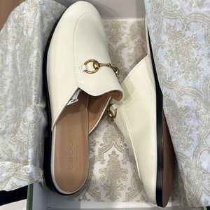 White leather slip on loafers